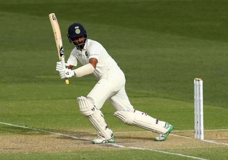 pujara101220182-min