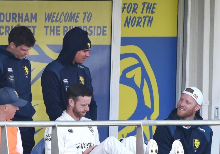 Durham's Ben Stokes watches from the players balcony during the LV